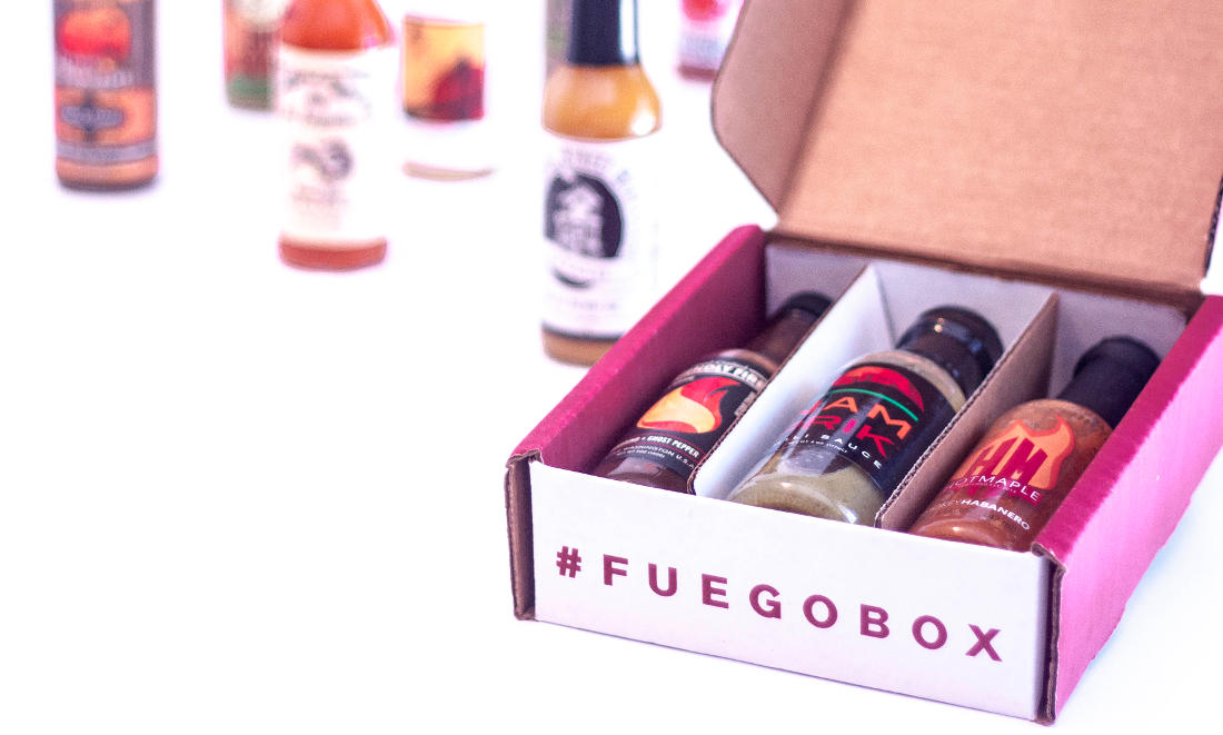 Fuego Box - Branded box with 3 slots containing bottles of hot sauce