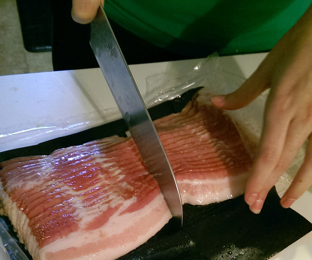 Cutting bacon in half